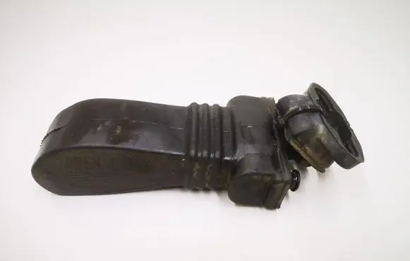 Front door check strap stopper