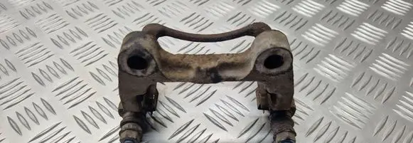 Volkswagen PASSAT B6 Brake caliper pad carrier rear 