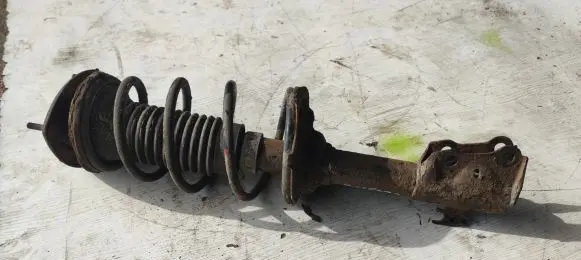 Front shock absorber with coil spring