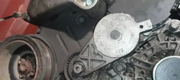 Generator/alternator belt tensioner