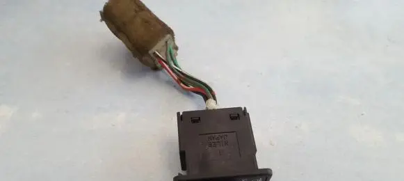 Headlight level height control switch