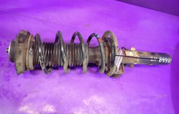 Volkswagen Polo IV 9N3 Front shock absorber with coil spring