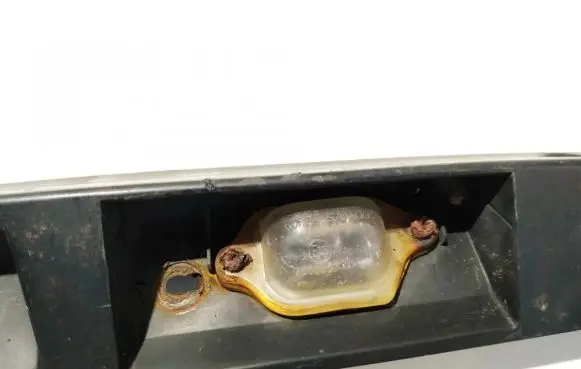 KIA Carens I Number plate light 005007