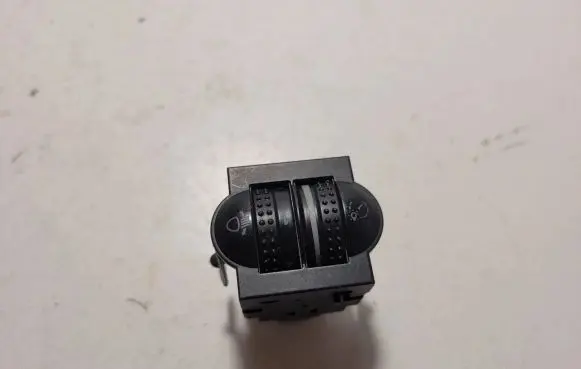 Headlight level height control switch