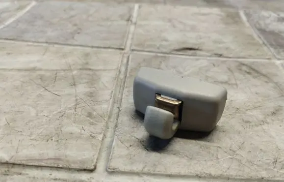 Sun visor clip/hook/bracket