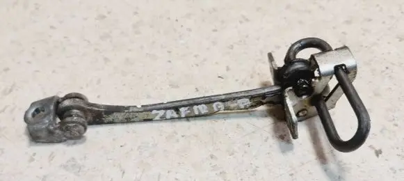 Opel Zafira A Front door check strap stopper 24434087