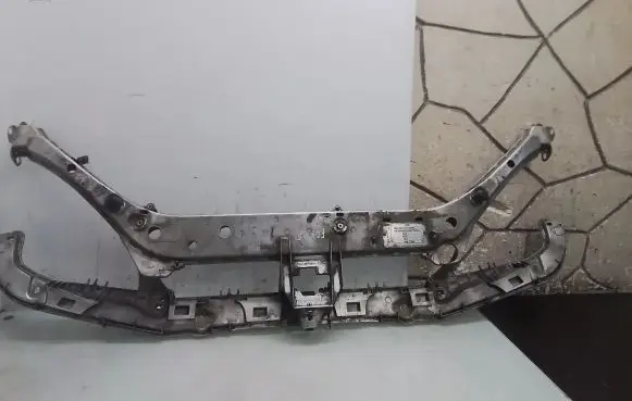 Radiator support slam panel bracket