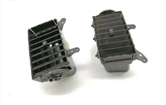 Chrysler Voyager Dash center air vent grill 05028820AA 05028821AA