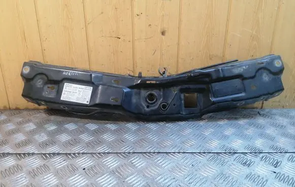 Top upper radiator support slam panel