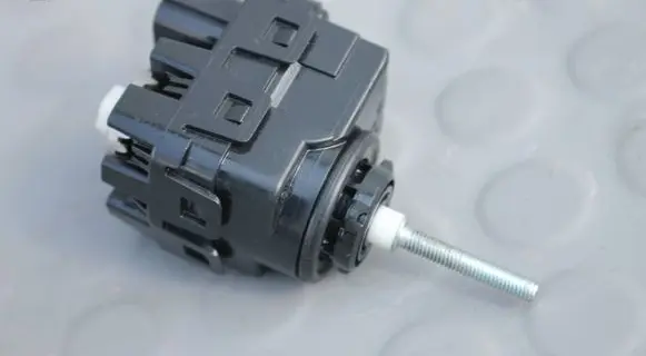 Mitsubishi L200 Headlight level adjustment motor HP15D
