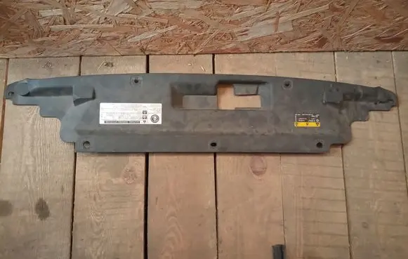 Engine bonnet/hood lock trim molding