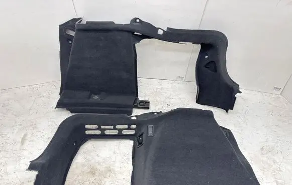 Trunk/boot lower side trim panel