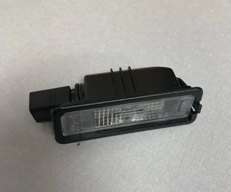 Volkswagen Golf V Number plate light 1K8943021