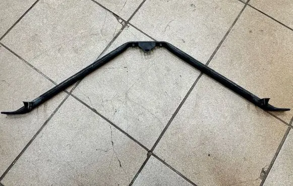 Radiator support slam panel bracket