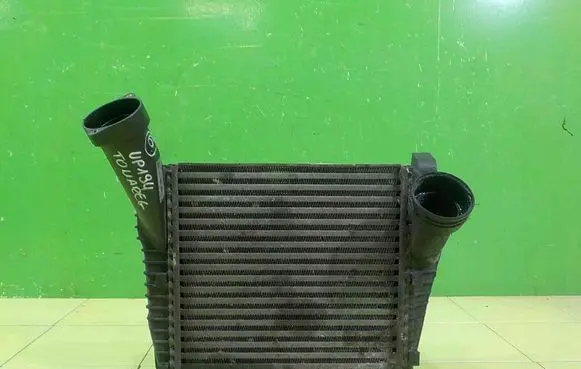 Volkswagen Touareg I Intercooler radiator UP194