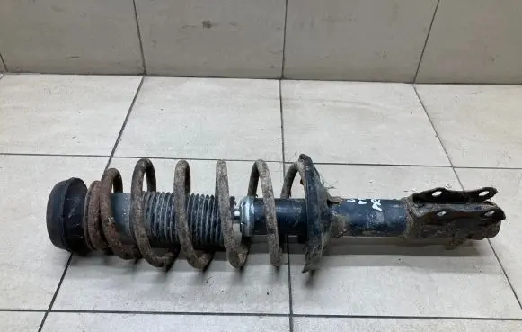 Volkswagen Vento Front shock absorber with coil spring 