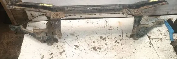 Radiator support slam panel