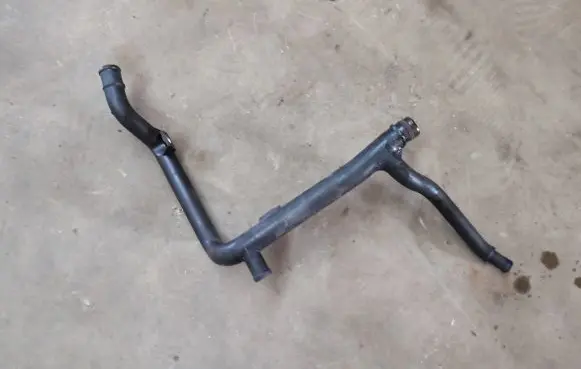 Volkswagen Golf VI Engine coolant pipe/hose 03L121065H