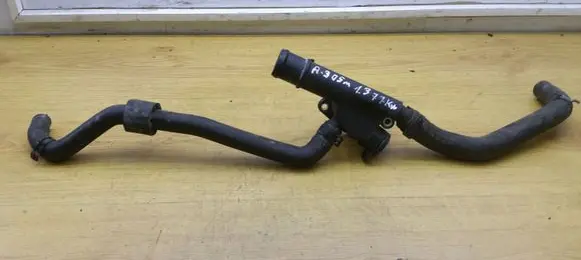 Thermostat/thermostat housing