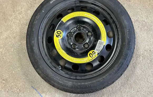 Volkswagen Golf V R16 spare wheel 1K0601027F 02L67011 T12570R16