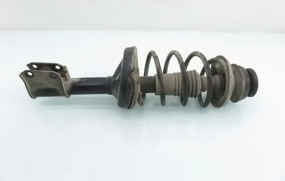 Renault Thalia I Front shock absorber with coil spring