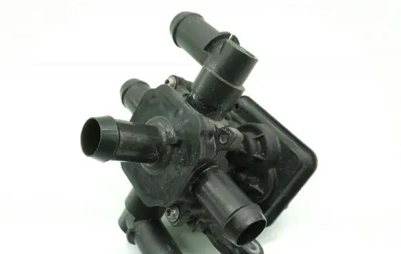 Thermostat/thermostat housing