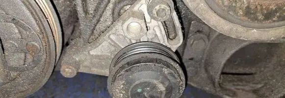 Generator/alternator belt tensioner