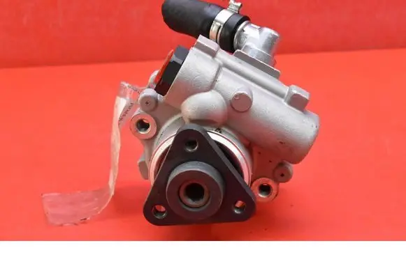 Volkswagen PASSAT B5 Power steering pump 55.5235