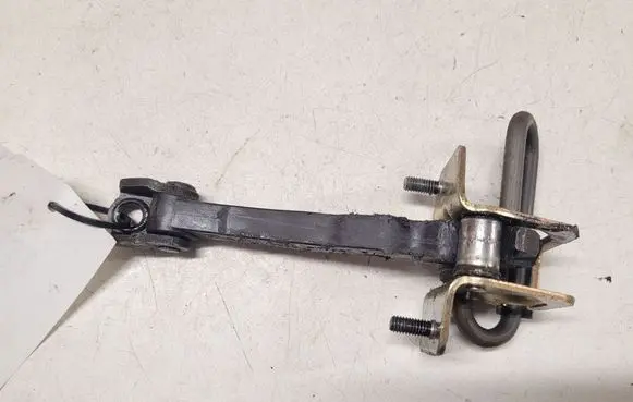 Volvo V70 Front door check strap stopper