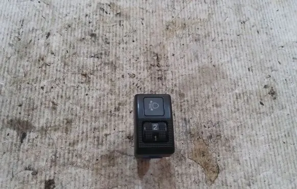 Headlight level height control switch