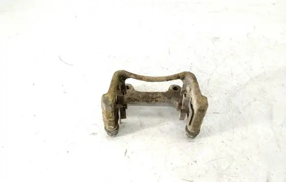 Volkswagen PASSAT B6 Brake caliper pad carrier rear 