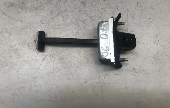 Rear door check strap stopper