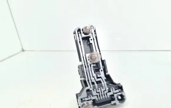 Tail light bulb cover holder