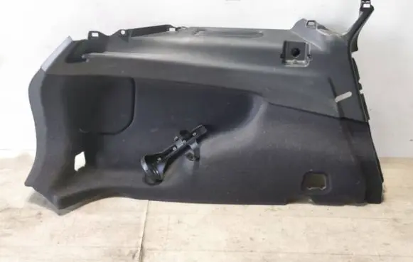 Trunk/boot lower side trim panel