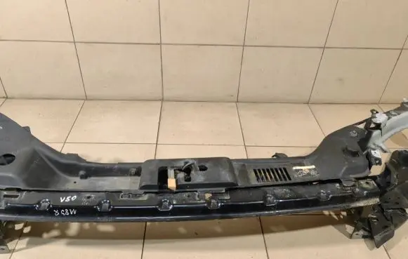 Top upper radiator support slam panel