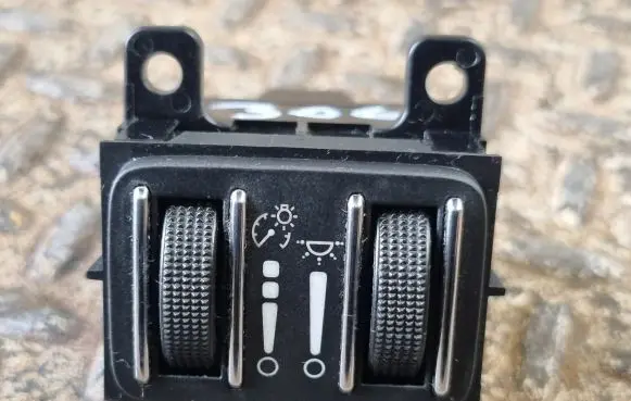 Panel lighting control switch