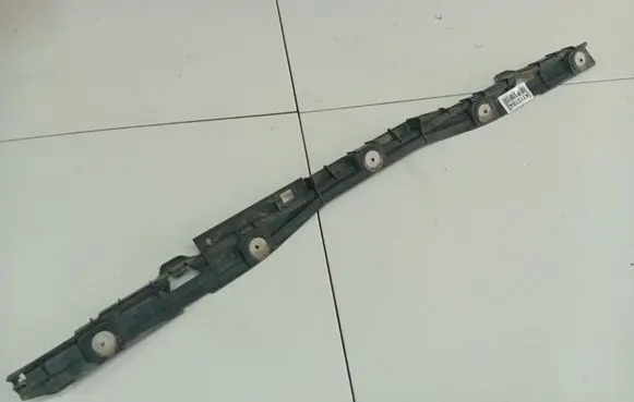 Opel Astra H Rear bumper mounting bracket 24460477