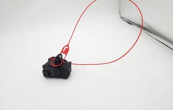 Fuel tank cap lock motor