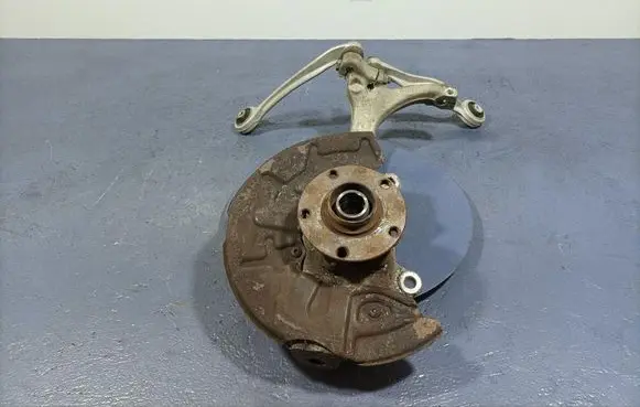 Front wheel hub spindle knuckle