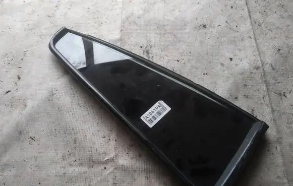 Mazda 2 Rear vent window glass as2
