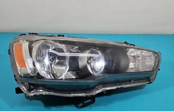 Mitsubishi Lancer VIII Headlight/headlamp IMPRK1359565
