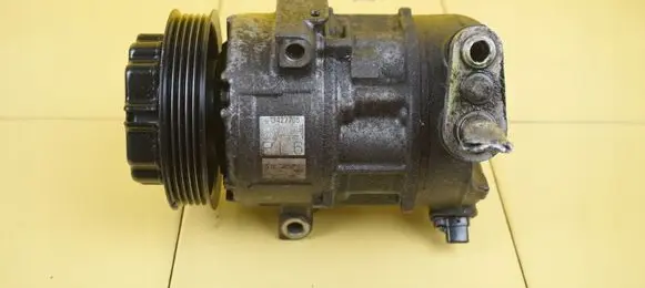 Opel Corsa E Air conditioning (A/C) compressor (pump) 13427705 B10XFT