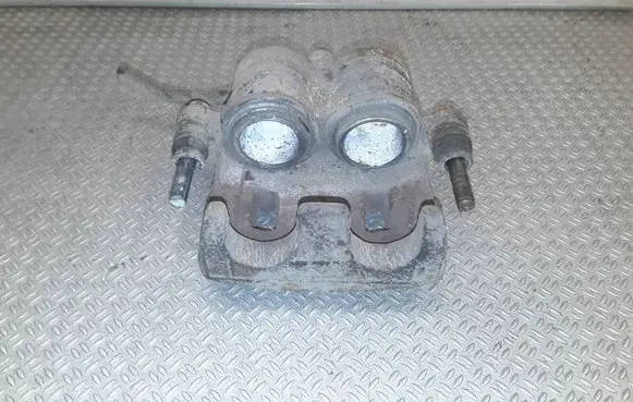 Subaru Impreza III Front brake caliper