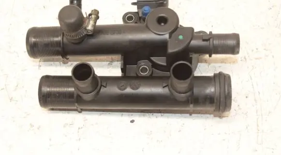 Thermostat/thermostat housing