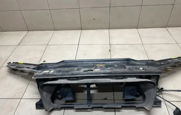Top upper radiator support slam panel
