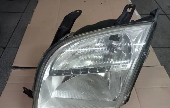 Ford Fusion Headlight/headlamp 24689700