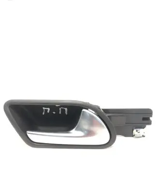 Volkswagen Golf V Front door interior handle