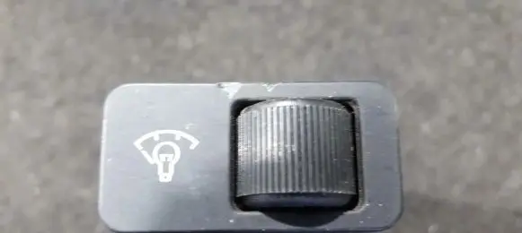 Panel lighting control switch