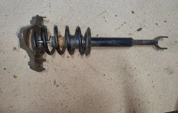 Front shock absorber with coil spring
