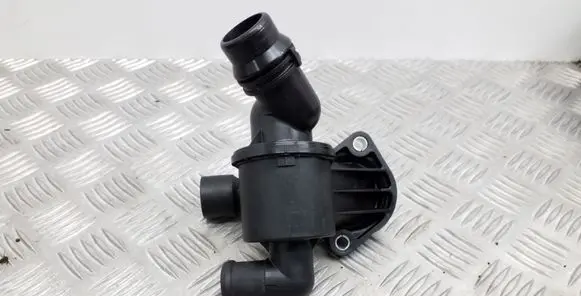 Thermostat/thermostat housing